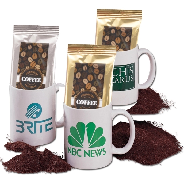 ceramic white branded mugs with coffee grounds and bags of beans