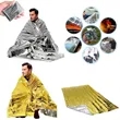 Silver and gold foil survival blanket outdoors