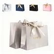 Bow-shaped gift bags