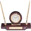 Desk clock with pen and pencil