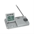 Slim traveler AM/FM radio/alarm clock/flashlight